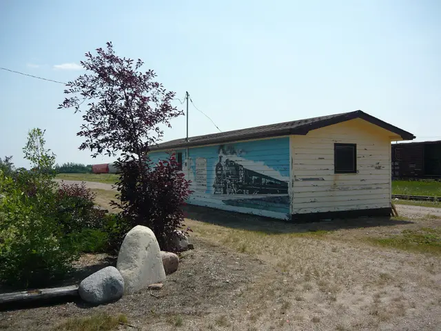 Old railway station with train mural